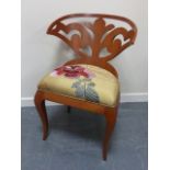 Unusual contemporary pierced fan back chair with upholstered seat, designer unknown.