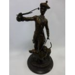 Large Cast Bronze of an 18thC Huntsman figure with a pair of dogs, on circular marble base,