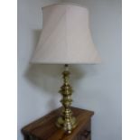 Large brass table lamp with shade, 88cms total height.