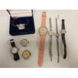 Assorted ladies wristwatches including a silver and marcasite Avia cocktail watch and two other