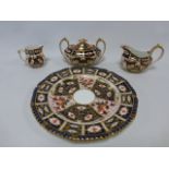 Royal Crown Derby Imari pattern twin handled pot, 23cm plate and two small jugs.