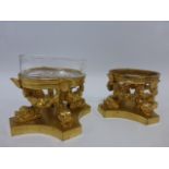 Two French 19th Century gilt bronze / bronze doré salts with stylized Dolphins and swags on concave