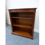 Brights of Nettlebed mahogany bookcase with two adjustable shelves, on shaped plinth base,