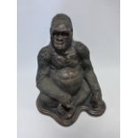 Large bronzed figure of a seated gorilla 38cm high.