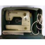 Bernina Minimatic 707 electric sewing machine with case.