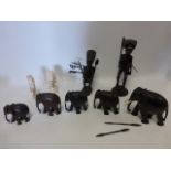 Collection of African carved items inc five assorted size elephants,