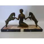 Art Deco style painted metal kneeling lady with two goats on marble base 43.5 x 12.3cm.