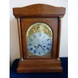 Edwardian chiming inlaid mantle clock of architectural form,