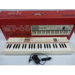 Casio MT-65 Electronic organ with original box & power adapter.