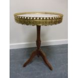 Spanish marble topped circular occasional table with tripod pedestal base with gilt mounts and