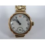 Gent's 9ct gold cased wristwatch with white enamel dial and Arabic numerals with subsidiary dial,