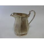 Mappin and Webb silver cream jug hallmarked Sheffield 1924, 7.7cms in height, 95.6g.