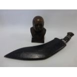 Bronzed bust of Winston Churchill, 12cms in height, together with a Kukri knife with sheaf.