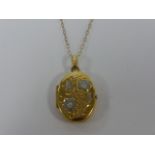 9ct gold locket pendant necklace, the locket with two-tone floral engraving, on a 16" chain.