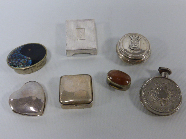 Seven small pill boxes and scent bottle etc.