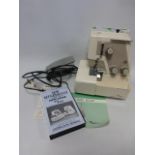 My Lock 203 overlock electric Sewing Machine with instruction booklet and video.