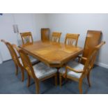 Furniture Village dining table and six chairs (4+2 carvers), the table with inlaid veneered top,