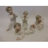 Lladro - four cherub winged Angels.