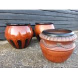 Three terracotta garden planter pots, monogrammed JR to interiors,