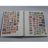 Stamps - A blue folder containing various stamps including Polish, German, Indian,