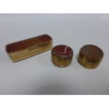 Three agate trinket pots with hinged lids.