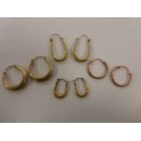 Four pairs of 9ct gold hoop earrings, 4.3g.