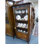 Walnut and ebonised display cabinet with architectural pediment,