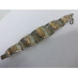 Peruvian silver and 18ct gold panelled bracelet, stamped Peru 925 18K RI.9352, with safety chain.