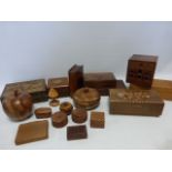 Collection of wooden trinket boxes and pots including two in the form of an apple and a book,