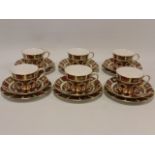 Royal Crown Derby Imari pattern 1128 set of six teacups with saucers and side plates.