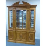 Furniture Village break fronted display cabinet with ornate broken neck pediment,