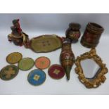 Collection of brightly painted treen items inc twin handled vase raised on three supports 14.