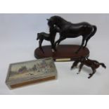 Royal Doulton 'Black Beauty & Foal' on wooden plinth, and a grazing foal,