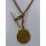 Victorian 9ct gold watch chain with T-bar and 22ct gold 1911 George V full Sovereign fob,
