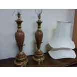 Pair of French large brass and marble table lamps, with cream shades,