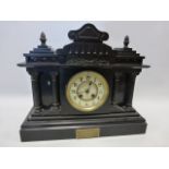 Early 20th Century slate mantle clock of architectural form, with pendulum and key, 40.