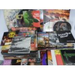 A collection of hundred + Heavy Metal LPs, 12" & 45s, picture discs,