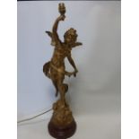 Gilded metal table lamp base in the form of a winged female in flowing robes,