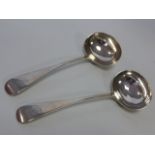 Pair of Victorian silver ladles hallmarked London 1884 by makers John Aldwinckle & James Slater,