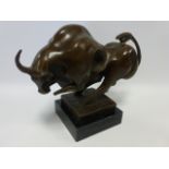 Cast Bronze after Milo of a stylised Bull raised on square marble plinth, 36cm long, 25cm high.