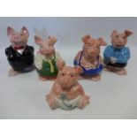 Five Nat West ceramic pig money boxes with stoppers