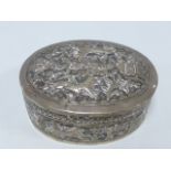 Oval white metal lidded trinket pot with embossed figures, animals and trees, 88.5x6.5x3.5cms, 78.