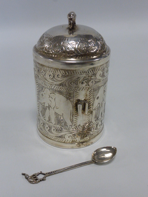 Indian silver lidded caddy with attached spoon engraved with panels of elephants, - Image 2 of 2