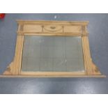 A 19th Century stripped pine overmantle mirror with applied rosette and swag decoration, 133x80cms.