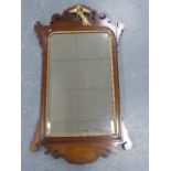 A Georgian mahogany wall mirror, in the Chippendale style, with fretted frame,