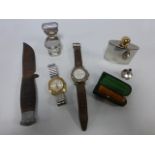 An eclectic mix including a cased cheroot holder, two Gent's wristwatches,