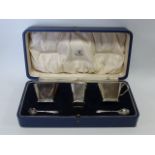 Cased silver cruet set of Art Deco design, hallmarked Birmingham 1936,