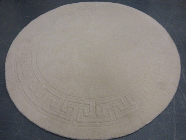 Circular Chinese wool rug, 185cms in diameter.