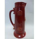 Tall ceramic jug in the Flamminian ware style, 28cms in height.