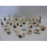 A collection of over 55 pieces of crested ware.